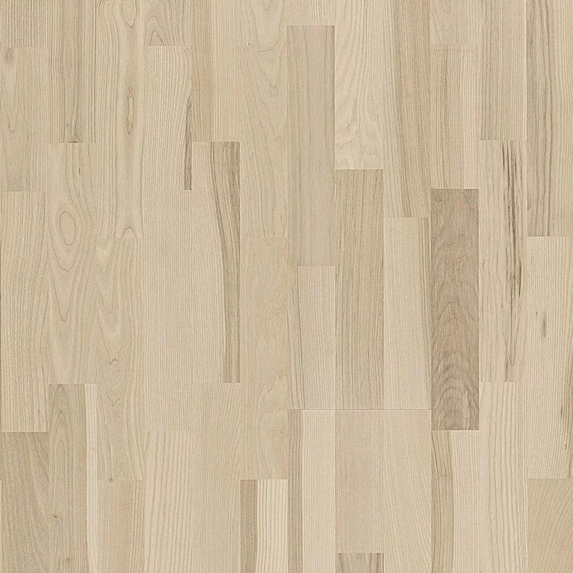 Natural wood flooring in light to dark brown shades, showcasing Ash Skagen's unique grain patterns and color variations, ideal for enhancing interior spaces.
